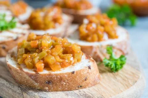 Toasted bread with vegetable caviar, made of squash, pumpkin, tomato, carrot Stock Photos