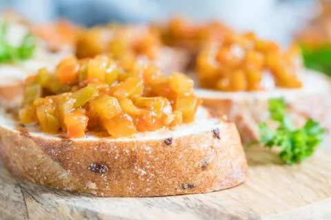 Toasted bread with vegetable caviar, made of squash, pumpkin, tomato, carrot Stock Photos