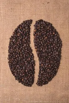 Toasted coffee shape beans Stock Photos