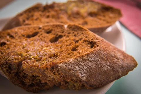 Toasted rye bread in a plate close-up. Morning breakfast Stock Photos