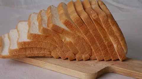 Toasted sliced white bread loaf Stock Footage 313486257