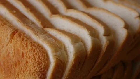 Toasted sliced white bread loaf Stock Footage 313815650