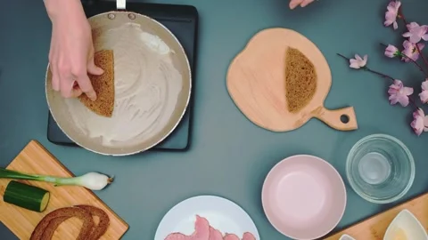 Toasted slices of bread in a frying pan Video stock 252302113