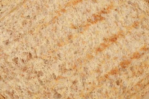 Toasted whole wheat bread surface diagonal texture Stock Photos