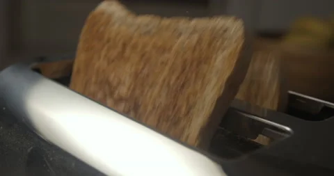 Toaster breakfast slowmotion close-up 4K Stock Footage 148448226