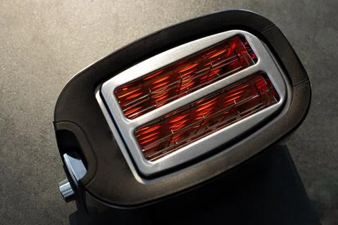 Toaster with hot heating elements. Top view. Close up. Stock Photos