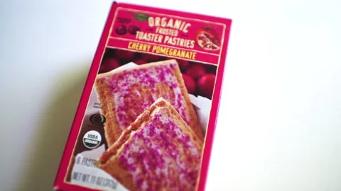 Toaster pastry cherry pomegranate jam filling, breakfast food by Trader Joe's Stock Footage 321985804