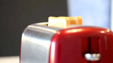Toaster throws out two toasts, cooking breakfast is ready Stock Footage 109257735