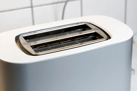 Toaster with two pieces of fried bread Stock Photos