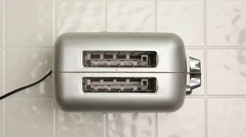 Toasting bread in toaster Stock-Footage 62279722