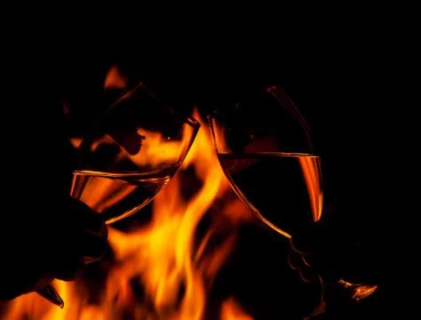 Toasting by the fire Foto stock