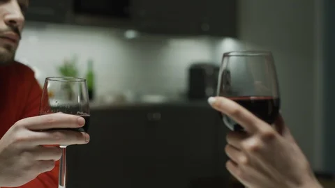 Toasting with red wine Stock Footage 99941387