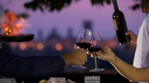 Toasting at sunset Stock Footage 128015126