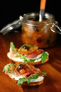 Toasts with apple chutney Stock Photos