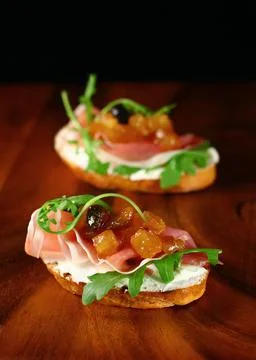 Toasts with apple chutney Stock Photos