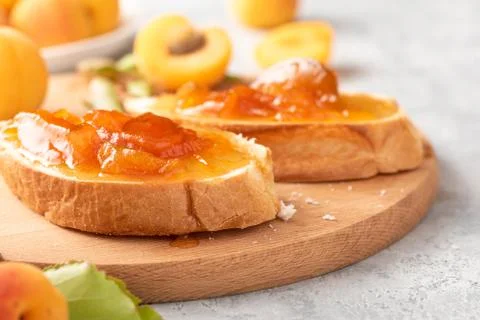 Toasts with apricot jam Stock Photos