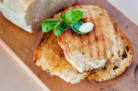 Toasts basil bread garlic Stock Photos