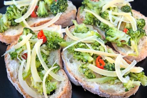 Toasts with broccoli Stock Photos