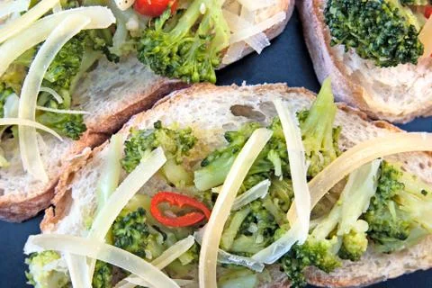 Toasts with broccoli Stock Photos