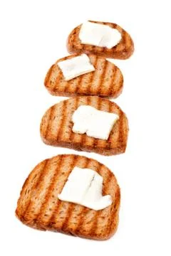 Toasts with butter for breakfast Stock Photos