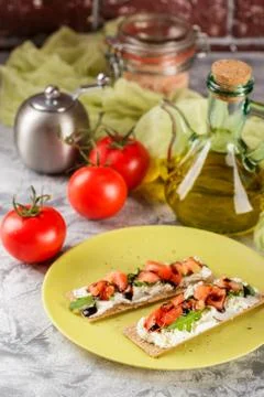 Toasts on crispbread with tomatoes Stock Photos
