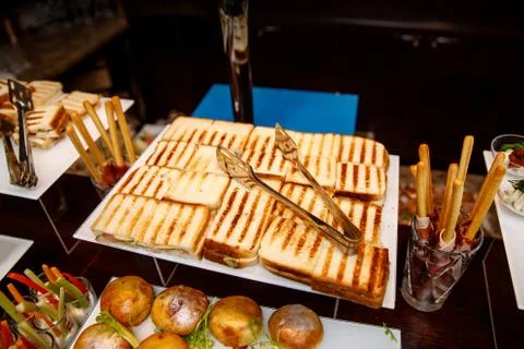 Toasts on event catering Stock Photos