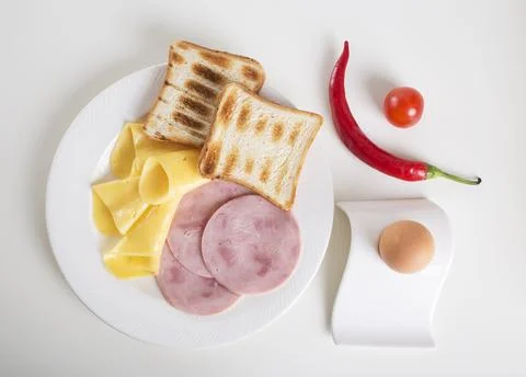 Toasts with ham and cheese. Stock Photos