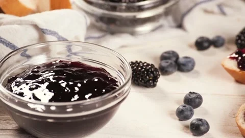 Toasts with jam and berries Stock Footage 136673600