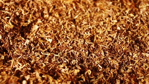 Tobacco grains rotating pattern macro texture background backdrop footage video. Video stock 91377976