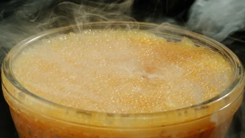 Tobiko, roe flying fish roe full frame macro close up, Sea of red caviar Stock Footage 309642513