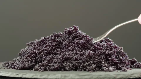 Tobiko, roe flying fish roe full frame macro close up, Sea of red caviar Stock Footage 309645161