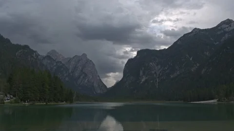 Toblach lake's time-lapse in a cloudy day, mountain's lake in dolomites, Italy Stock Footage 205542135