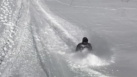 Tobogganing Man Stock Footage 170274597