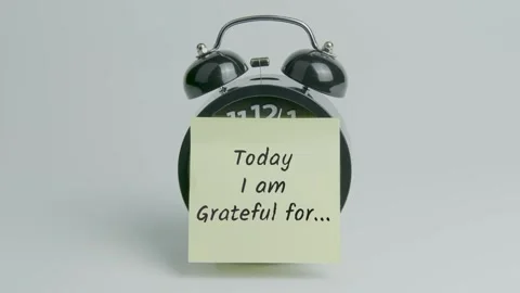 Today I Am Grateful for Text or Word on Yellow Note Paper Sticking Clock Stock Footage 299864904