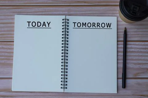 Today tomorrow text written on notepad with pen and cup of disposable coffee Stock Photos