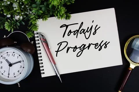Todays Progress text with alarm clock and magnifying glass Stock Photos