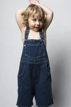 Toddle in overall Foto stock