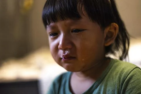 Toddler Boy Crying With snot Bubble In His Nose Stock Photos