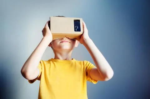 Toddler boy using a new virtual reality headset Stock Photos