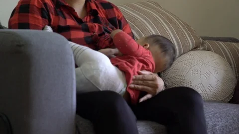 Toddler breastfeeding Stock Footage 113347573