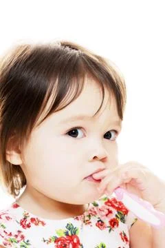 Toddler brushes teeth Stock Photos