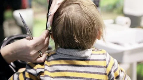 Toddler Child Getting His First Haircut Stock Footage 70248604