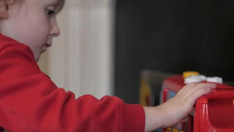 Toddler child playing with interactive toy. Stock Footage 148095729