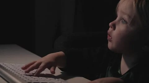 Toddler with computer keyboard Stock Footage 59123738
