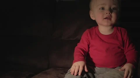 A toddler on couch Stock Footage 59123974