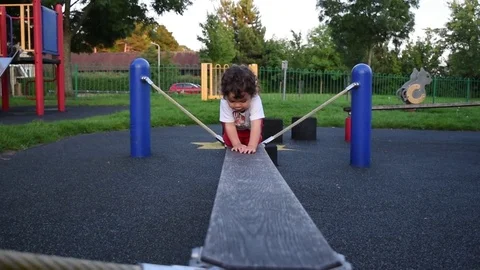 Toddler crawling in the play park Video stock 79605320