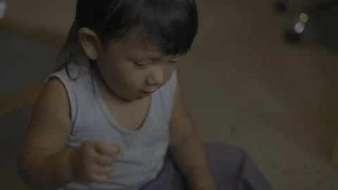 Toddler Is Curiously Exploring The DSLR Camera With Tiny Hands 03 Stock Footage 314208732