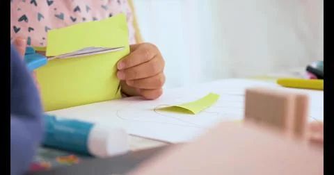 Toddler cutting with scissors and doing crafts Stock Photos