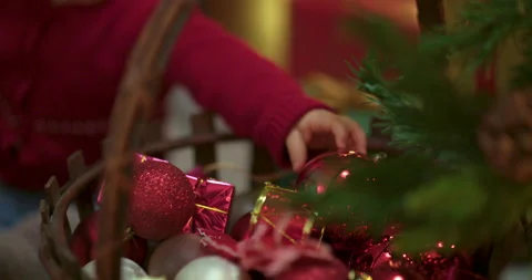 Toddler decorating christmas tree Stock Footage 143710220