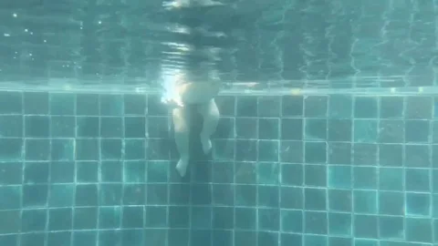 Toddler dives into the pool Stock Footage 87011204